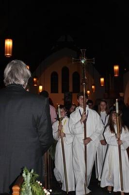 Acolytes lead the procession out of the Church at the end of the service.