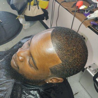 Taper haircut with light enhancements