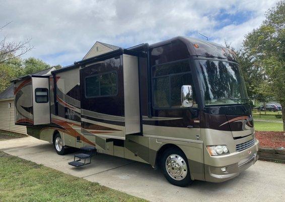 An RV that we repaired it was leaking so we put a new roof on it until the top of the roof