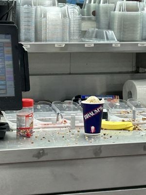 All sorts of crap on the counters next to a customer's order.