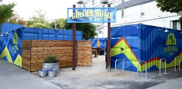 Recent Big City Signs work… hand painted graphics on shipping-containers-turned-restaurant-buildings at Golden Road Brewing in Sacramento CA