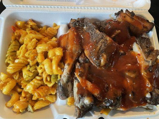 Jerk Chicken over rice and beans and Caribbean Mac and Cheese