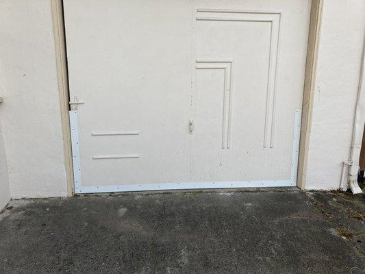 1 inch gaps around garage door sealed with  primed flash to create a quarter inch gap no rodents will squeeze through.Just needs Paint.