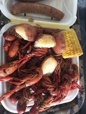 Mild Crawfish Platter with Potatoes and Corn and I got Two Sausage links as well.