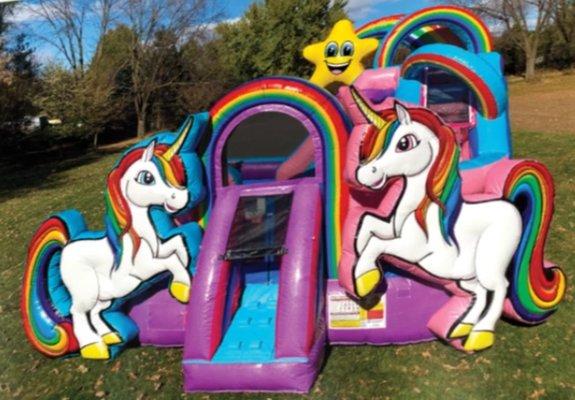 Unicorn Kidzone Wet/Dry Combo. Unicorns, rainbows, a shooting star and a literally glittery bounce house make this visual overload a star