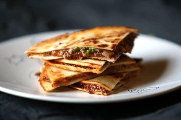 Chili-Dilly - A large quesadilly filled with Hills chili, diced onions, and fresh shredded cheddar cheese