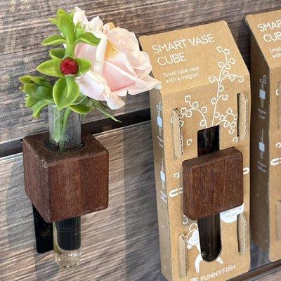 Smart vase cubes for a pop of color on your walls.