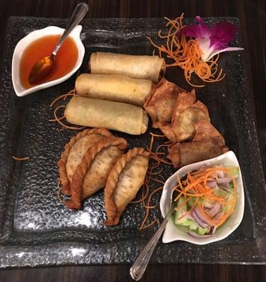 Crispy spring rolls, samosas and pork basil puffs