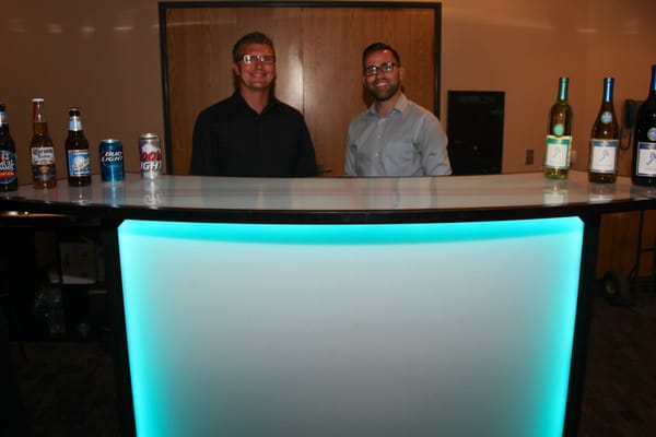 Adam and John bartending the Rock n' Blues concert