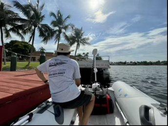 Towing a boat with our dingy.