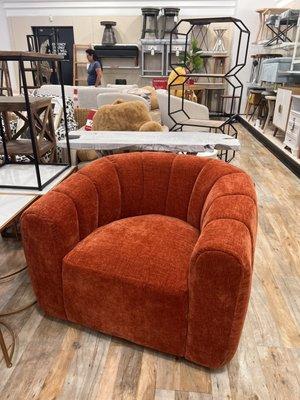 Oversize orange swivel chair I purchased.