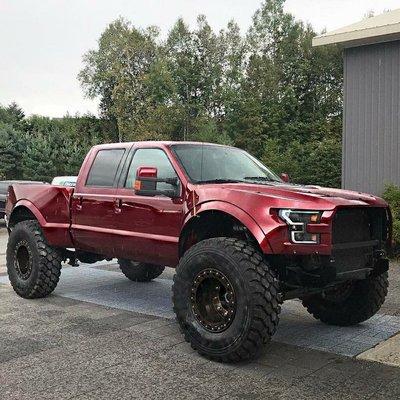 2016 F-250 with Raptor front clip and massaged truck bed.