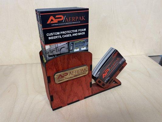 A custom-made wooden brochure and business card holder