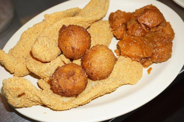 Fried catfish with homemade hush puppies and yam