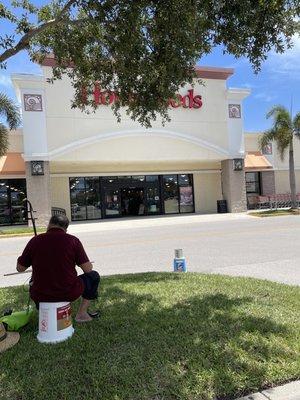 Man playing Japanese Music in front of home goods!