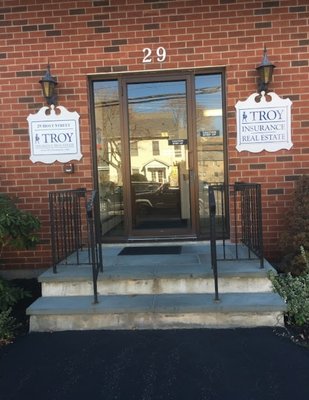 Outside front stairs of the Troy Insurance office.