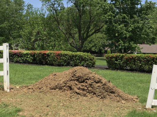 Mulch pile still on way of fence repair.