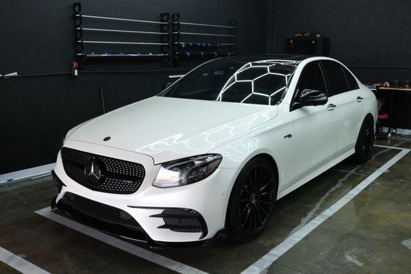 Silver E43 AMG. Wrapped in full Gloss White with black accents