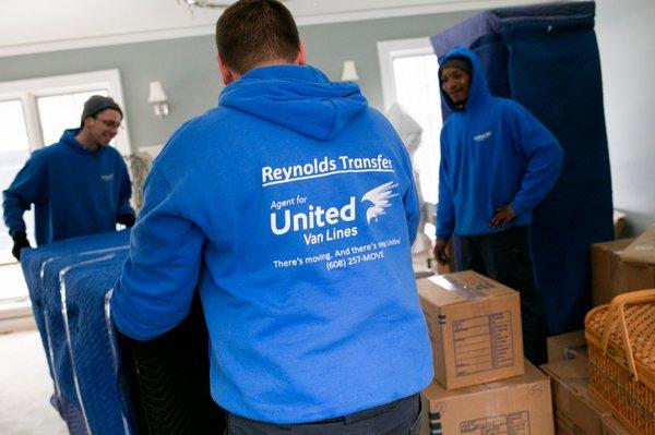 Crew moving household goods for a residential move. Reynolds Transfer & Storage, Inc.