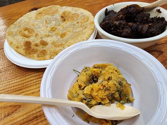 Aloo bharta, kala bhuna, and paratha