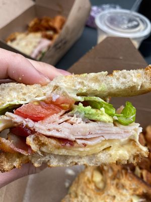 Truffle turkey club sandwich