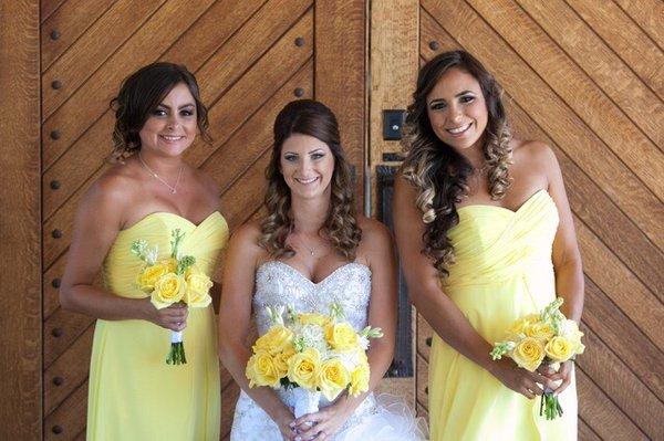 My sister on the left, bride, & me on the right. Jessi did all of our makeup and it looks STUNNING!!