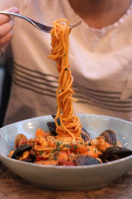 Sapori di Mare ($30) Spaghetti, clams, mussels, langoustine, shrimp, cherry tomatoes, light white wine tomato sauce.