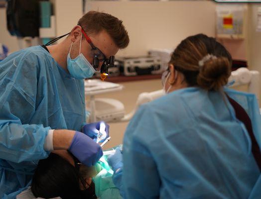 Dental students and residents perform most of the treatments and are supervised by licensed faculty dentists.