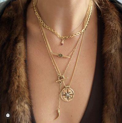 Anvil+Aura necklace stack
gold medallion with star cut diamond, talon toggle Y necklace, double barb necklace, layering chain choker