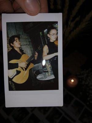 Marc & Hannah performing at a venue in Brooklyn