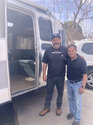 Mister G in front of my Airstream along with Manuel