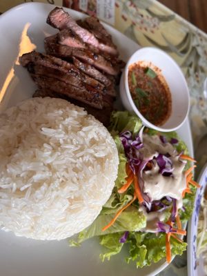 Thai steak, sticky rice and salad.