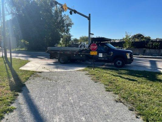 This is the truck...,I am on the canal tow path going south.  They periodically obstructed the small part of the trail open with forklift