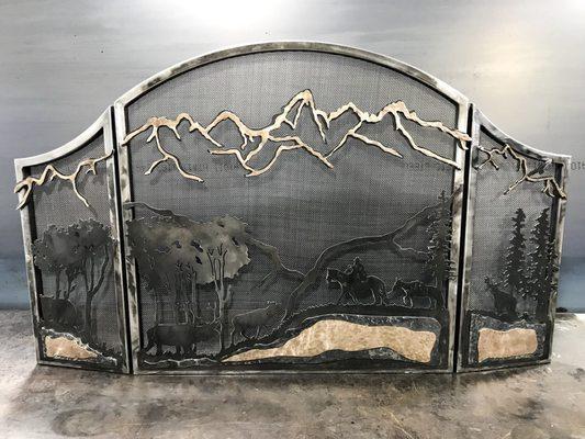 Free standing fireplace screen with hammered bronze and hammered steel.