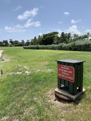 More than one sign stating no alcohol and tobacco on course.