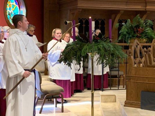 Lighting of the Advent wreath candles.