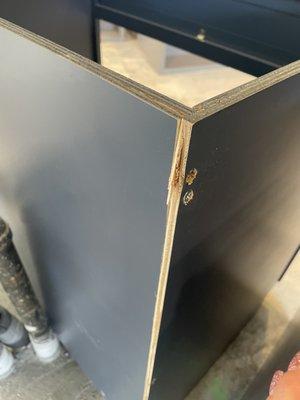 Cracked, split cabinet from installers