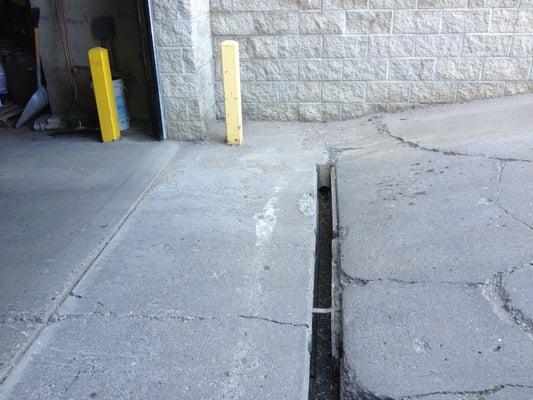 They didn't clean this drain until June, so every rain made underground parking flood. And they won't replace the grate.