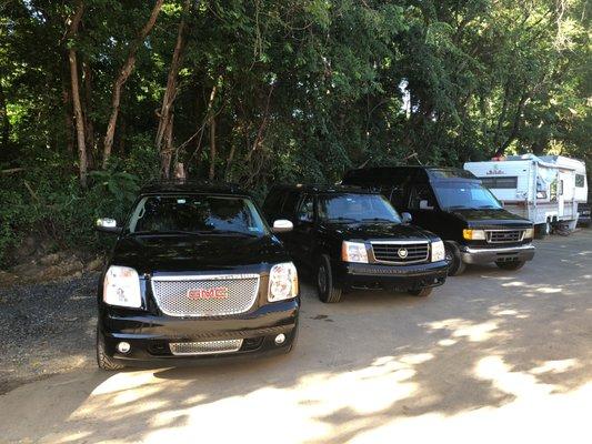 Cadillac Escalade's Yukon Dinali's and a 10 passenger vans available