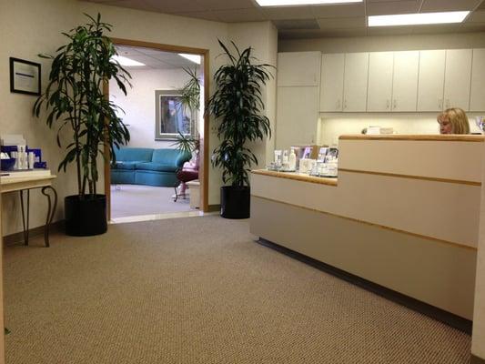 Front desk with a seating area