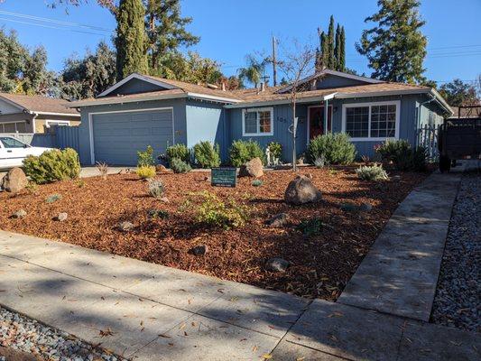 The Yard is coming along! We used medium size all natural redwood chips! Great contrast with the home. We love the earth tones!