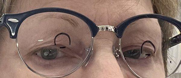 Markings show why I couldn't see out of new glasses---prescription off!