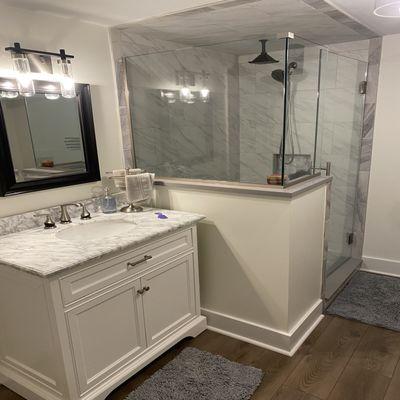 Bathroom remodel with rain head, knee wall, custom layout, shower bench, custom glass, Rochester Hills, Michigan