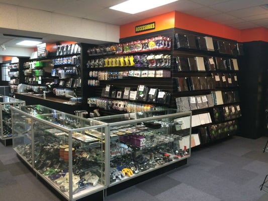 Store interior from center of store. Consoles, accessories, and rare console titles are kept behind the counter and in the case seen here.