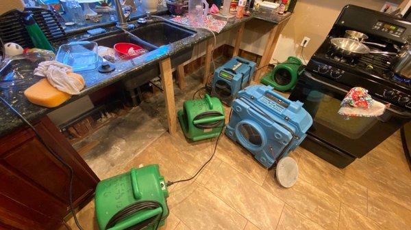 Equipment set up to dry kitchen.  Hepa air scrubber in place to purify air.