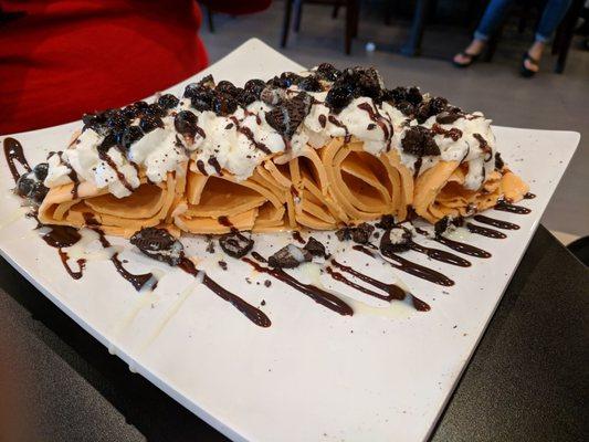 Thai rolled ice cream with marshmallow, boba, chocolate and condensed milk sauce.