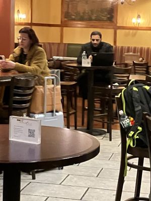 The manager and host sat on his phone and did nothing for any customers or staff