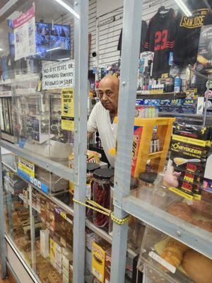 Rude guy you don't tell customers to wait while you are just standing there doing nothing