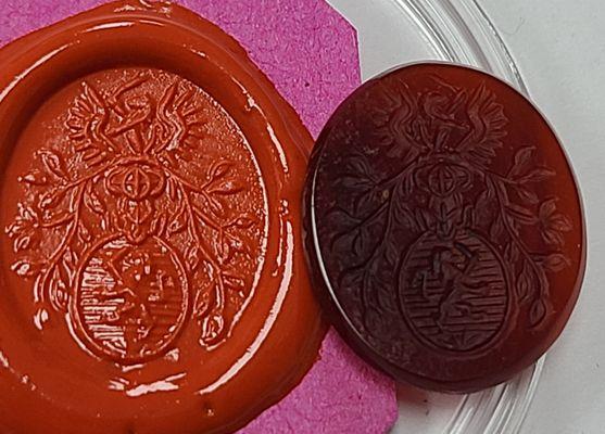 Hand engraved, coat of arms, Carnelian. Shown with the wax impression