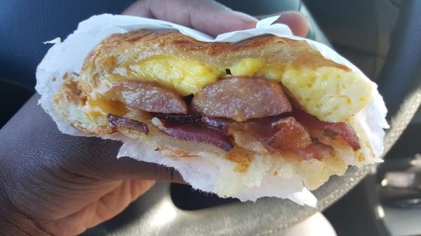 Bacon,sausage,egg, and cheese croissant. SO DELICIOUS! !!!!!!! AND ONLY $3.75